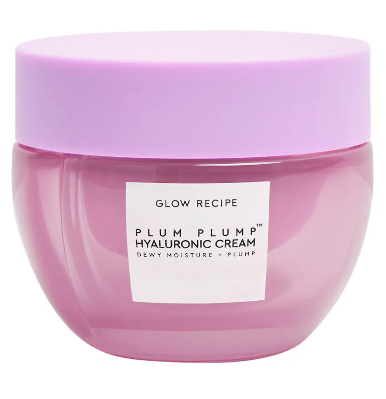 A vibrant pink jar with a matching pink lid, labeled clearly to showcase its main ingredient, hyaluronic acid, promising dewy moisture and plumping effects.